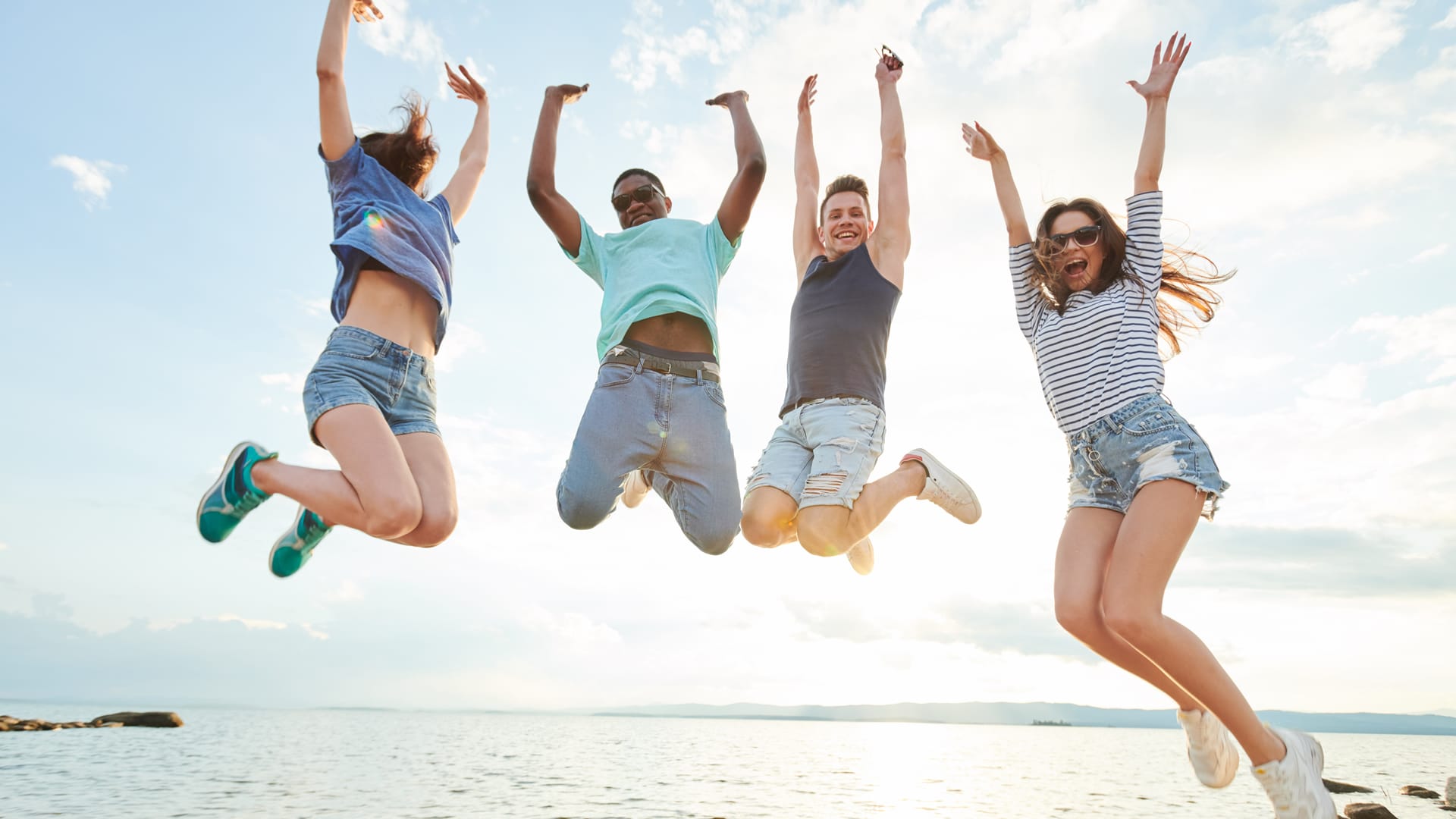 Clients excited after hypnotherapy sydney Young clients jumping and excited after best hypnotherapy in sydney