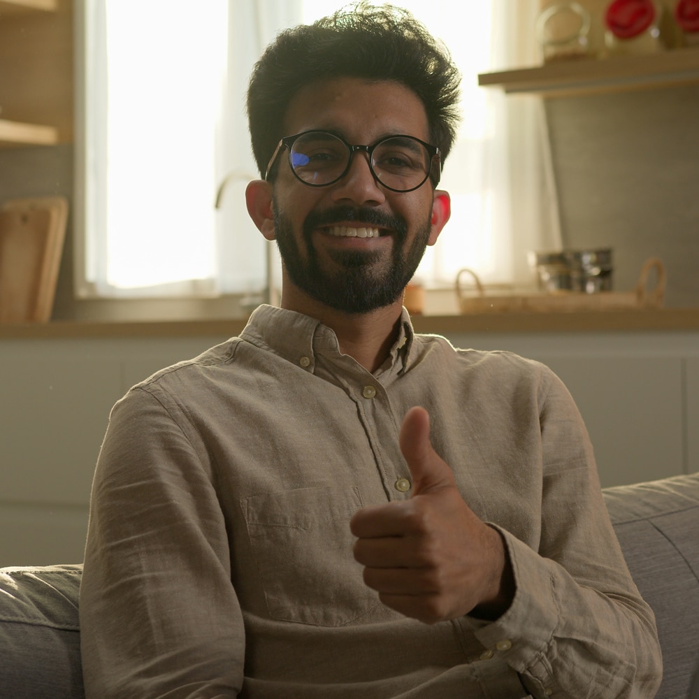 Man giving thumbs up to hypnosis session Man giving thumbs up to hypnosis session