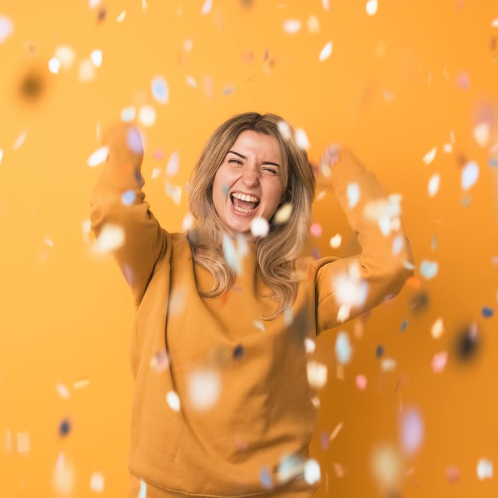 Woman celebrating after hypnotherapy in Sydney Woman celebrating recovery after hypnotherapy in Sydney