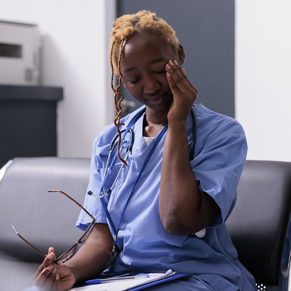 Tired nurse stressed in Sydney cTired nurse stressed in Sydney hospital Tired nurse under stress in Sydney hospital