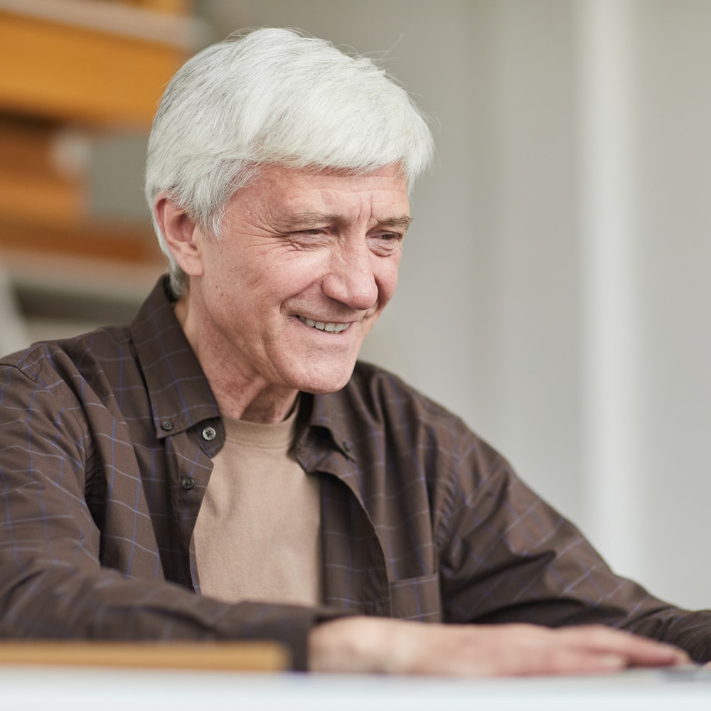 Old man having online hypnosis Old man having online hypnosis session