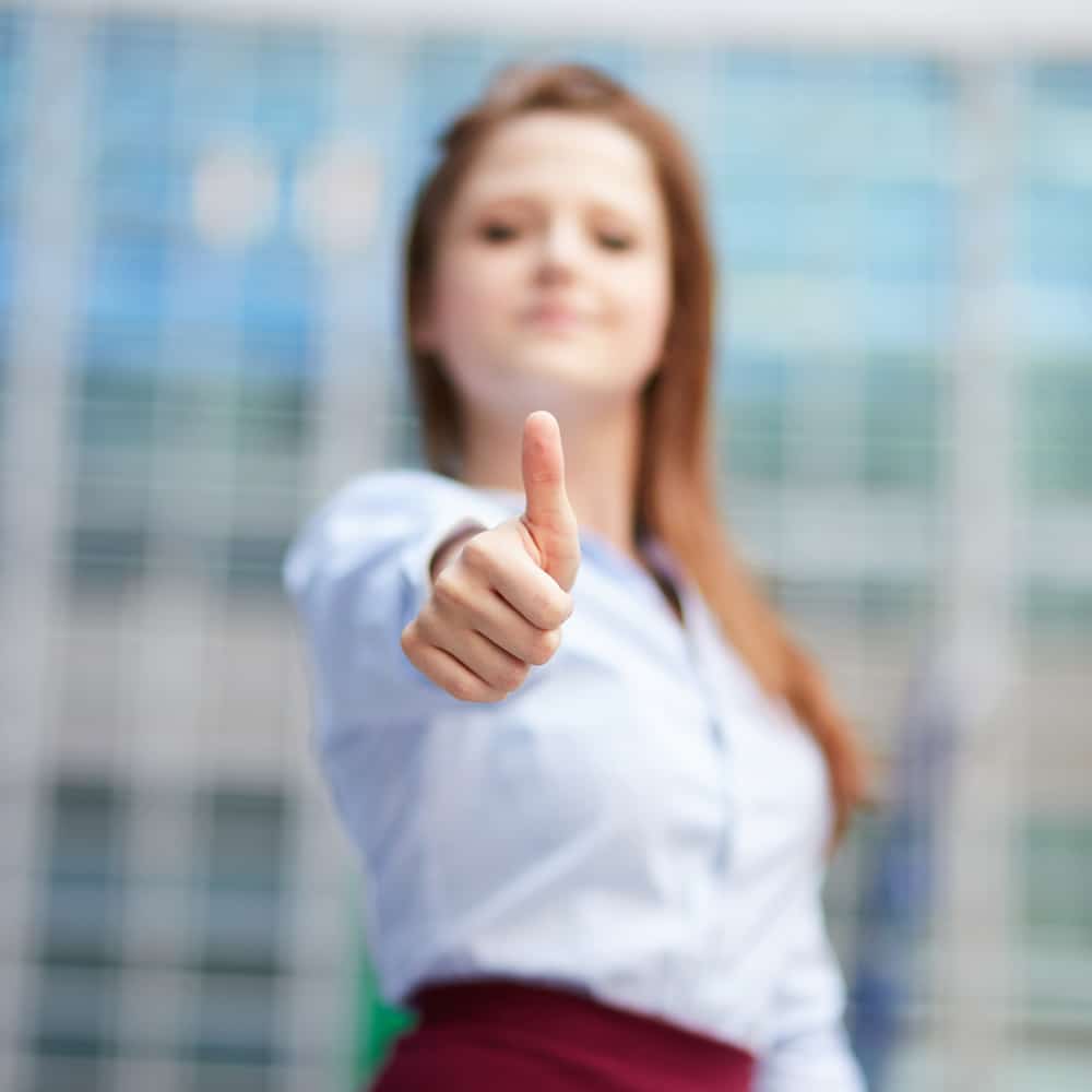 Woman giving thumbs up Woman giving thumbs up to hypnotherapy