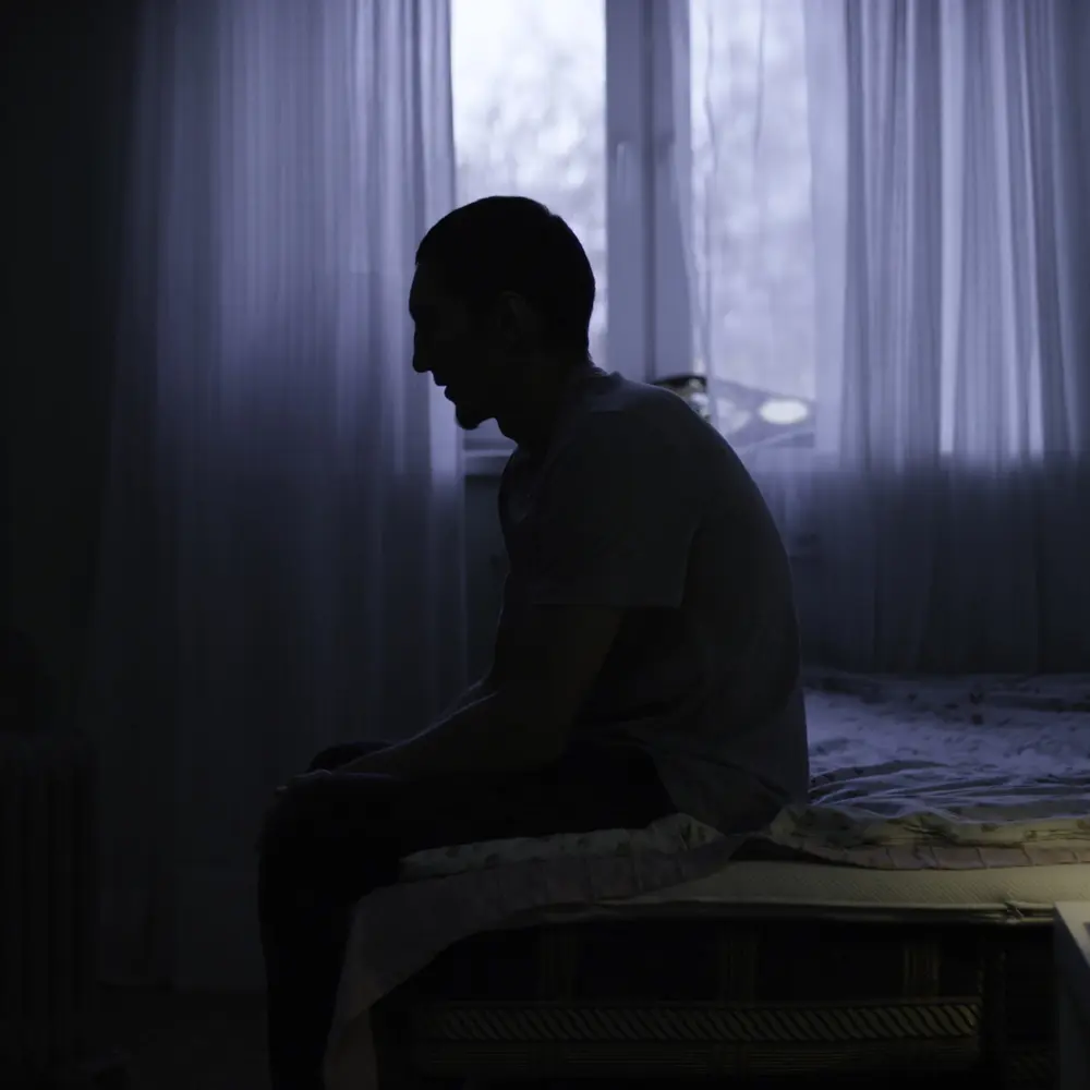 Insomnia man suffering before hypnosis for sleep disorders