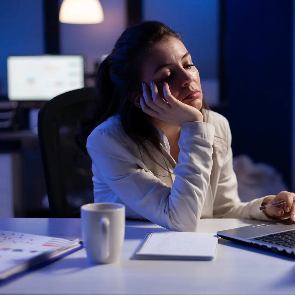 Insomnia woman in Sydney office needing sleep hypnosis