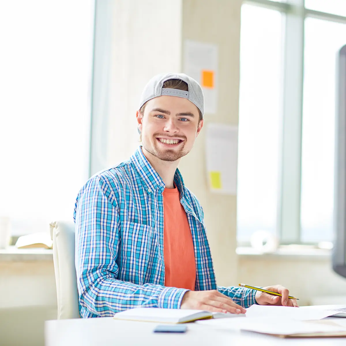 Man smiling after hypnotherapy for self-esteem Young man smiling after having hypnotherapy for self-esteem
